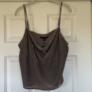 Gray, double-layered tank top with adjustable straps and cowls neck.
